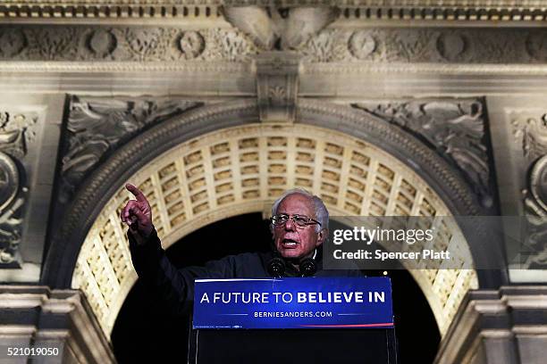 Democratic Presidential candidate Bernie Sanders speaks under the arch at historic Washington Square Park to thousands of people at a rally on April...