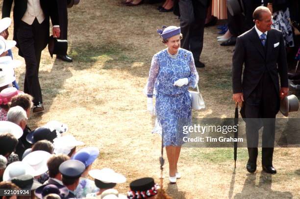The Queen And Prince Philip At A Buckingham Palace Garden Party