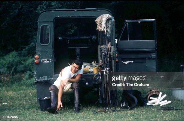 Prince Charles Getting Changed For Polo At Smiths Lawn Polo, Windsor.sitting In The Back Of His Four Wheel Drive Land Rover Car