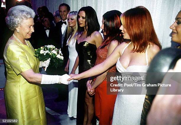 The Queen At The Royal Command Performance At The Victoria Palace Theatre On 1st December 1997 Shaking Hands With Pop Star Geri Halliwell From The...