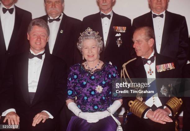 The Queen And Prince Philip Sitting With President Bill Clinton At A Banquet Held At Portsmouth Guildhall As Part Of The D-day Commemorations. The...