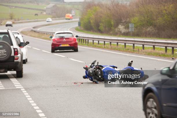 a crash on the a66 near penrith, cumbria, uk, involving a car and a motorbike. - motorcycle accident stock-fotos und bilder