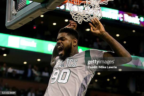 Amir Johnson of the Boston Celtics dunks in the third quarter against the Miami Heat at TD Garden on April 13, 2016 in Boston, Massachusetts. NOTE TO...