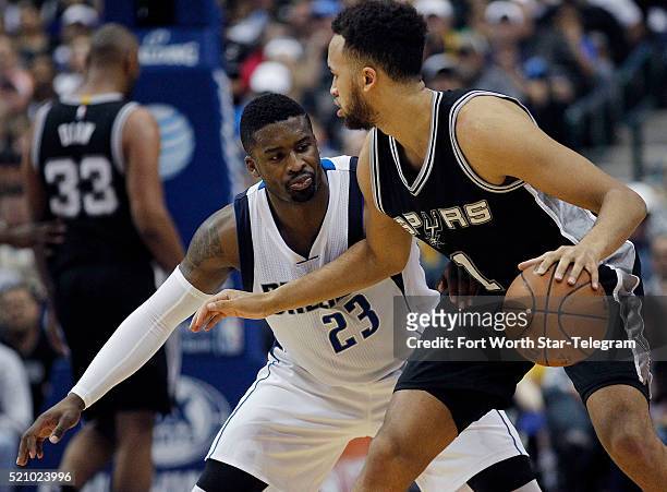 The Dallas Mavericks' Wesley Matthews guards the San Antonio Spurs' Kyle Anderson in the third period on Wednesday, April 13 at the American Airlines...