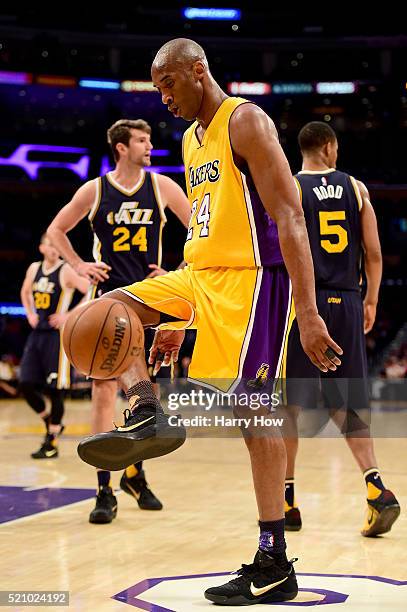 Kobe Bryant of the Los Angeles Lakers kicks the ball in the first quarter against the Utah Jazz at Staples Center on April 13, 2016 in Los Angeles,...