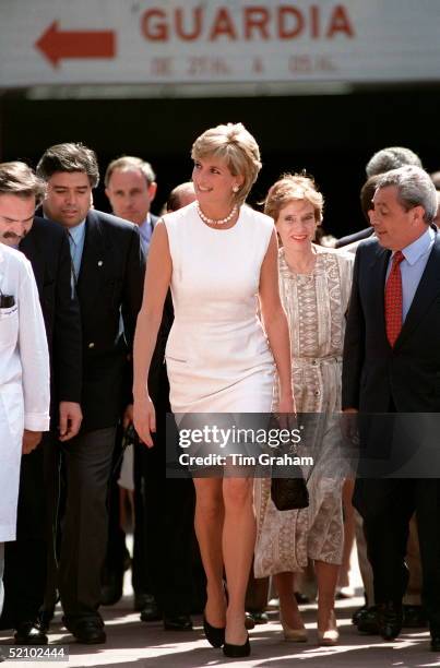 Diana, Princess Of Wales, Arrriving In Argentina. The Princess Is Wearing A White Sleeveless Shift Dress Designed By Fashon Designer Versace And...