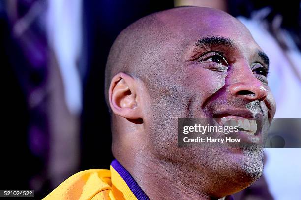 Kobe Bryant of the Los Angeles Lakers smiles as a video is being played before taking on the Utah Jazz in Bryant's final NBA game at Staples Center...