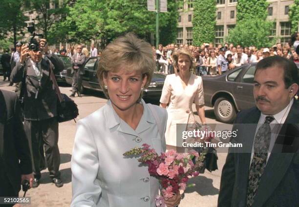 The Princess Of Wales Visits Cook County Hospital, Chicago With Her Lady-in-waiting, Viscountess Sarah Jane Campden.american Bodyguard At Right.