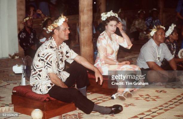 The Queen And Prince Philip Attending A Traditional Feast During Their Tour Of The South Pacific.