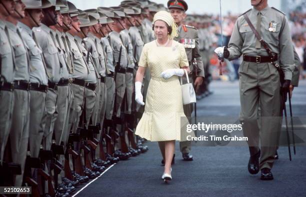 The Queen Reviewing Troops On Her Arrival In Brisbane, Australia During Her Jubilee Tour In February & March 1977