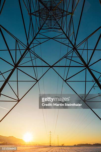 inside view of an electrical tower in front of a winter sunset - klagenfurt foto e immagini stock