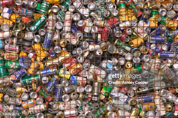 aluminum cans in recycling unit - cannette photos et images de collection