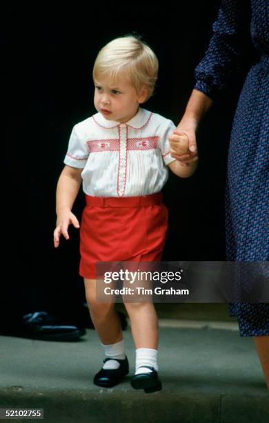 Prince William Holding Hands With His Nanny As He Leaves The Lindo Wing Of St Mary's Hospital After Visiting His New Brother.