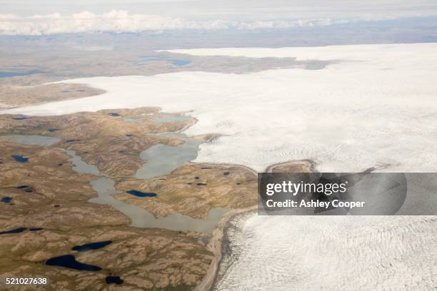 aerial view of greenland ice sheet - poolkap stockfoto's en -beelden