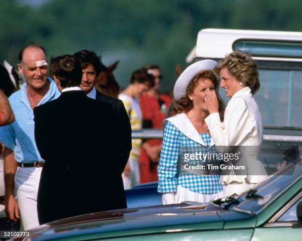 Diana, Princess Of Wales, Laughing And Joking With Sarah Ferguson, Sarah's Father, Major Ronald Ferguson At Left, And Friends Including Oliver Hoare...