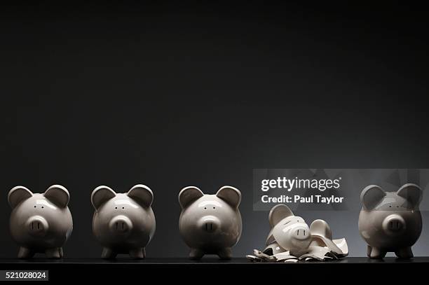 cracked piggy bank - smashed piggy bank stock pictures, royalty-free photos & images