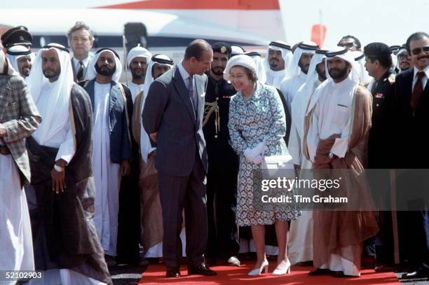 The Queen And Prince Philip Laughing Together On A Visit To Abu Dhabi On Their Tour Of The Gulf States.they Were Watching The Ruler Hh Sheikh Zayed...