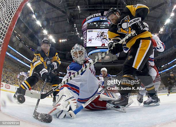Patric Hornqvist of the Pittsburgh Penguins scores past Antti Raanta of the New York Rangers in Game One of the Eastern Conference Quarterfinals...