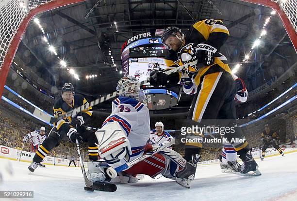 Patric Hornqvist of the Pittsburgh Penguins scores past Antti Raanta of the New York Rangers in Game One of the Eastern Conference Quarterfinals...