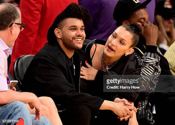 The Weeknd & Bella Hadid are seen sitting courtside as the Los Angeles Lakers take on the Utah Jazz at Staples Center on April 13, 2016 in Los...