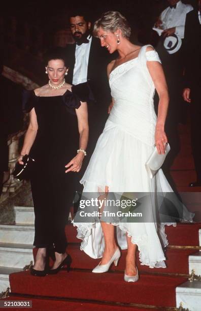 Princess Diana In Rio De Janeiro, Brazil Attends A Charity Gala Ballet Performance At The Municipal Theatre. Wearing A White Chiffon Dress Designed...