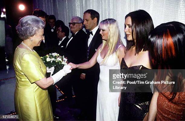 The Queen At The Royal Command Performance At The Victoria Palace Theatre On 1st December 1997 Shaking Hands With Pop Star Emma Bunton Of The Pop...