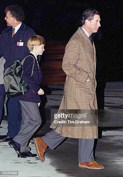 Prince Charles With Prince Harry Arriving At Zurich Airport For Their Skiing Holiday In Switzerland On New Years Day 1st January.