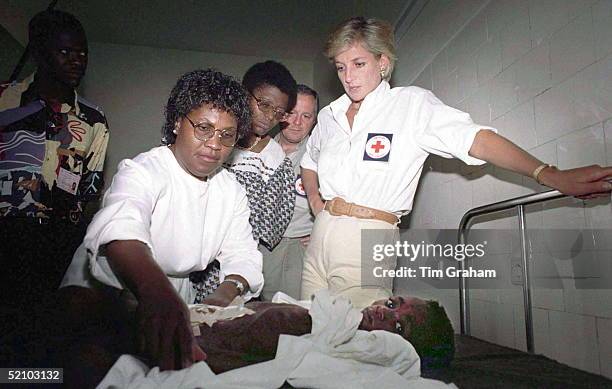 Diana, Princess Of Wales With Seven Year Old Helena Ussoua Who Lost Most Of Her Intestines In A Landmine Blast.