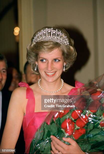 Diana, Princess Of Wales, Holding A Bouquet Of Red Roses As She Arrives At La Scala Opera House To Watch A Performance Of "turandot" During Her...