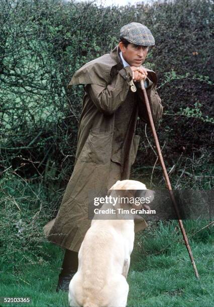 Prince Charles At The Fernie Hunt Cross Country Team Event Wearing Barbour Style /dryasabone Style Raincoat, Flat Cap And Walking Stick And With His...