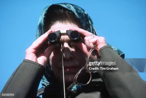 Queen At Badminton Horse Trials Using Binoculars While Watching The Cross-country Section