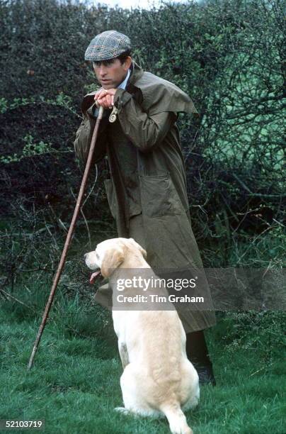 Prince Charles At The Fernie Hunt Cross Country Team Event Wearing Barbour Style /dryasabone Style Raincoat, Flat Cap And Walking Stick. With His Pet...