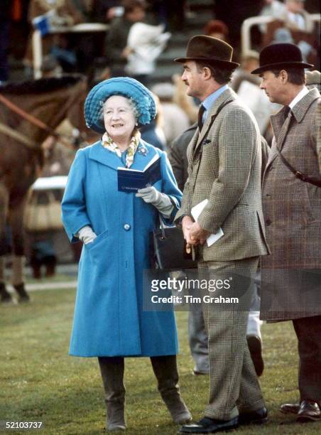 The Queen Mother Looking At Race Horses During Her Visit To The National Hunt Festival At Cheltenham Racecourse. The Queen Mother Is Wearing A Blue...