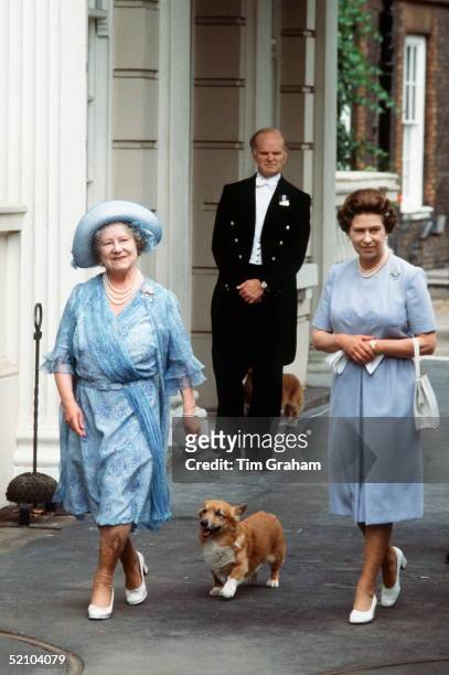 The Queen Mother, Smiling, With Her Daughter, Queen Elizabeth Ll, Outside Clarence House With Her Pet Corgi On Her 83rd Birthday. The Queen Mother Is...