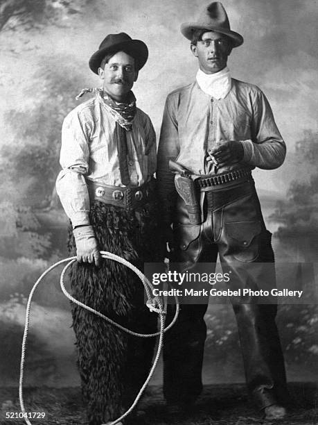 Male cowboy characters with bullet chaps, early 1900s.