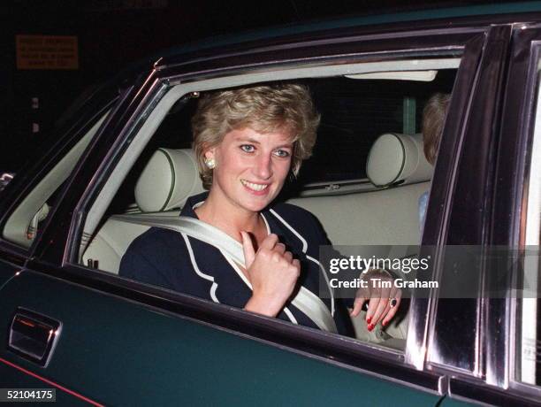 Princess Diana Adjusting Her Seat Belt As She Leaves The Hilton Hotel By Car After Attending A Charity Lunch.