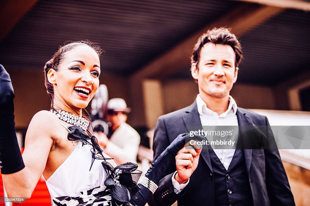 Celebrity couple on red carpet in Cannes
