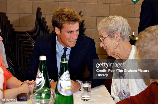 Prince William Giggling With An Old Lady During His Visit To The Lunch Club For The Elderly At Sighthill Community Education Centre In Glasgow,...