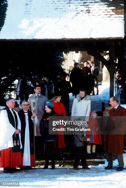 Diana, Princess Of Wales, Smiling And Joking With Prince Philip As They Leave Sandringham Church In The Snow After Attending Christmas Day Service...