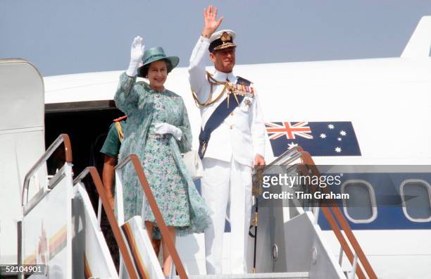 The Queen And Prince Philip Arriving For An Official Tour Of Papua New Guinea. He Is Wearing Tropical White Naval Uniform