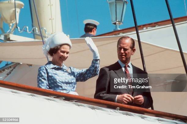 The Queen And Prince Philip Waving On Board Royal Yacht Britannia During An Official Visit To Kuwait During The Tour Of The Gulf