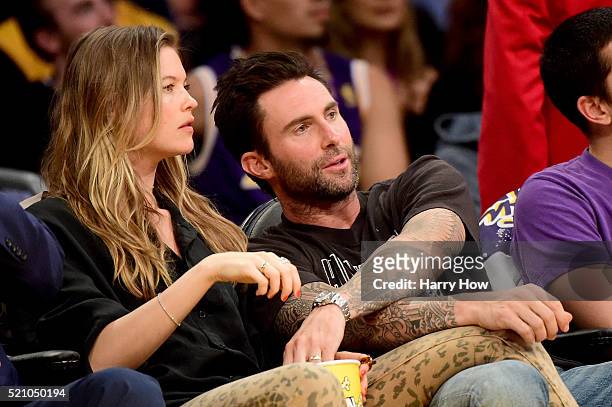 Singer Adam Levine and Behati Prinsloo are seen courtside at Staples Center on April 13, 2016 in Los Angeles, California. NOTE TO USER: User...