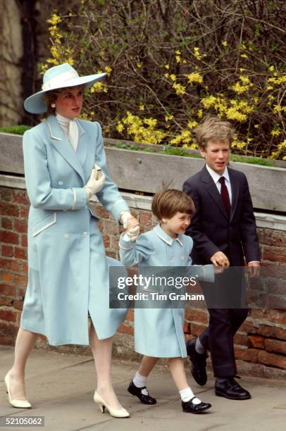 Diana, Princess Of Wales, With Her Son, Prince William And Her Nephew, Peter Phillips, On Their Way To Easter Service. The Princess Is Wearing A Pale...
