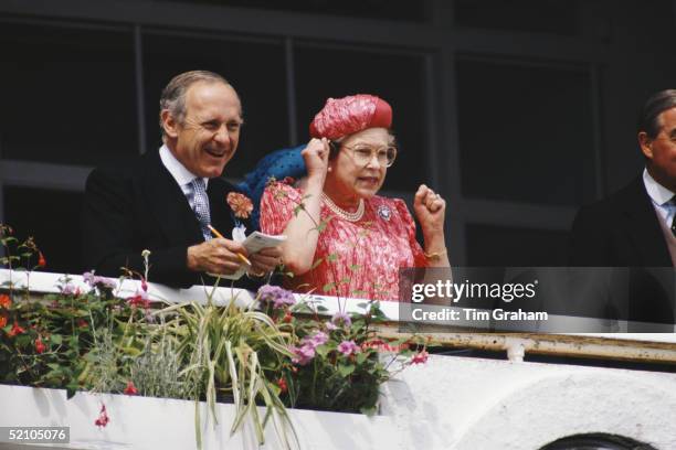 The Queen At The Derby Races With Her Private Secretary Sir William Heseltine.