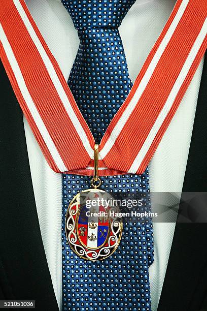 Former All Black captain Richie McCaw wears the insignia of a Member of the Order of New Zealand, for services to New Zealand during an investiture...
