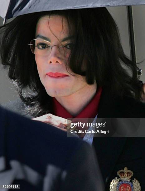 Singer Michael Jackson departs after the second day of jury selection in his trial on nine counts of child molestation February 1, 2004 in Santa...