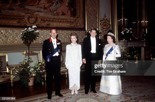 The Queen And Prince Philip With President Ronald Reagan And Nancy Reagan At A State Banquet At Windsor Castle.