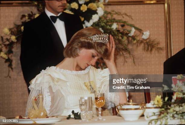Princess Diana Adjusting Her Tiara During A Banquet In New Zealand
