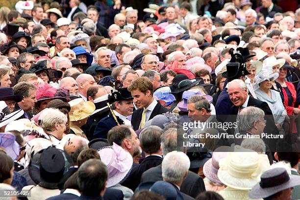 Prince William, Towering Above The Crowd, Accompanies Prince Charles Who Is Hosting A Garden Party At The Palace Of Holyroodhouse As He Moves Among...