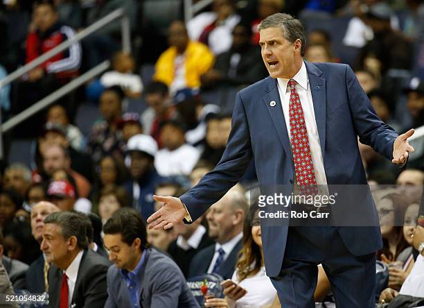 Washington Wizards owner Ted Leonsis, far left, looks on as head coach Randy Wittman reacts to a first half play against the Atlanta Hawks at Verizon...